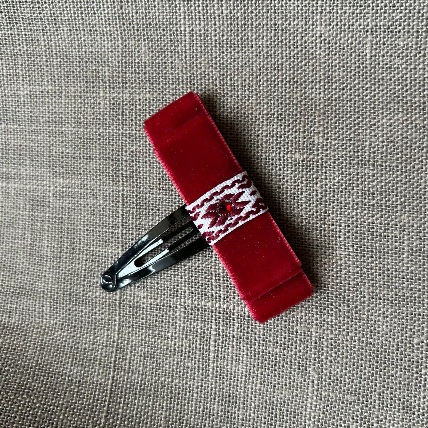 Latviska matu sprādze (AIPU 127)