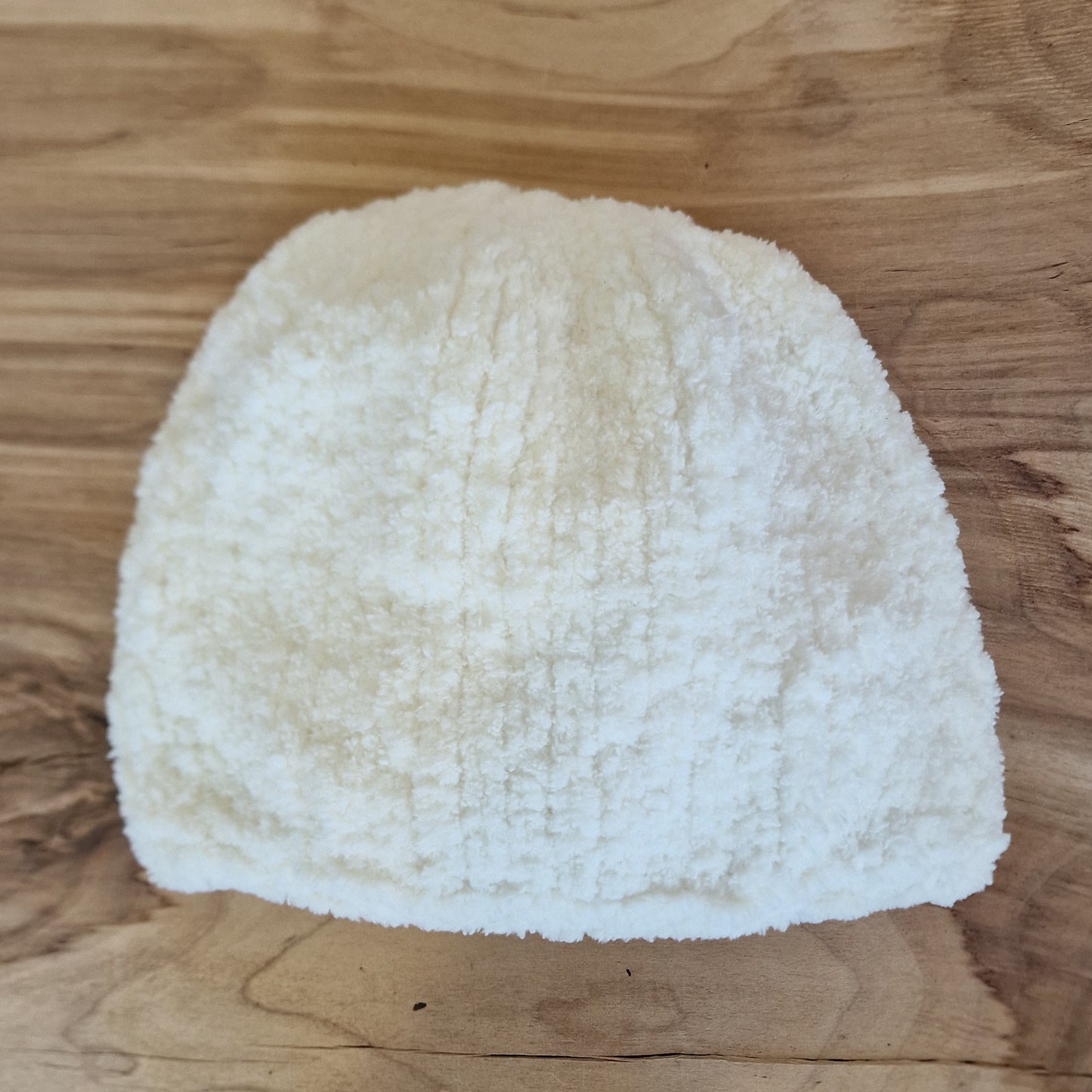 Hand-knit soft cream hat (INKU 20)