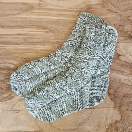 Hand-knitted greenish-white warm socks, size 37-39. with braid pattern on top (ME 17)