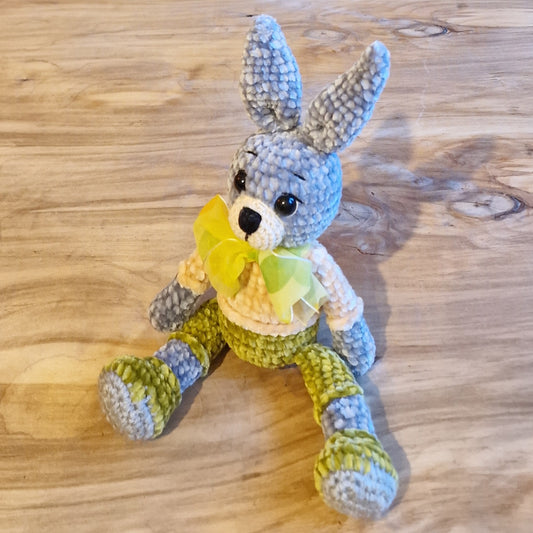 Crocheted toy bunny gray with green pants (AIPU 41)