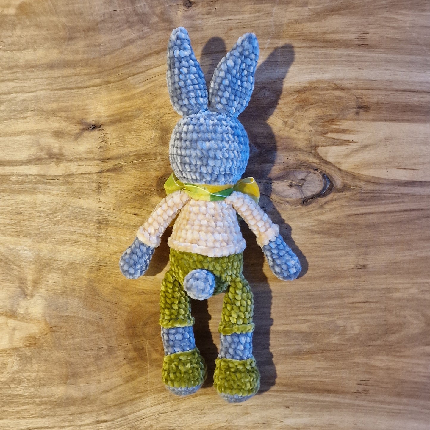 Crocheted toy bunny gray with green pants (AIPU 41)
