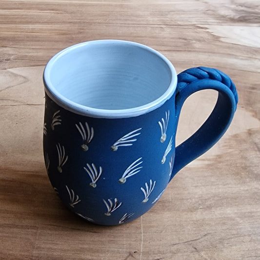 Light colored clay mug with illustrations (MASP 77)