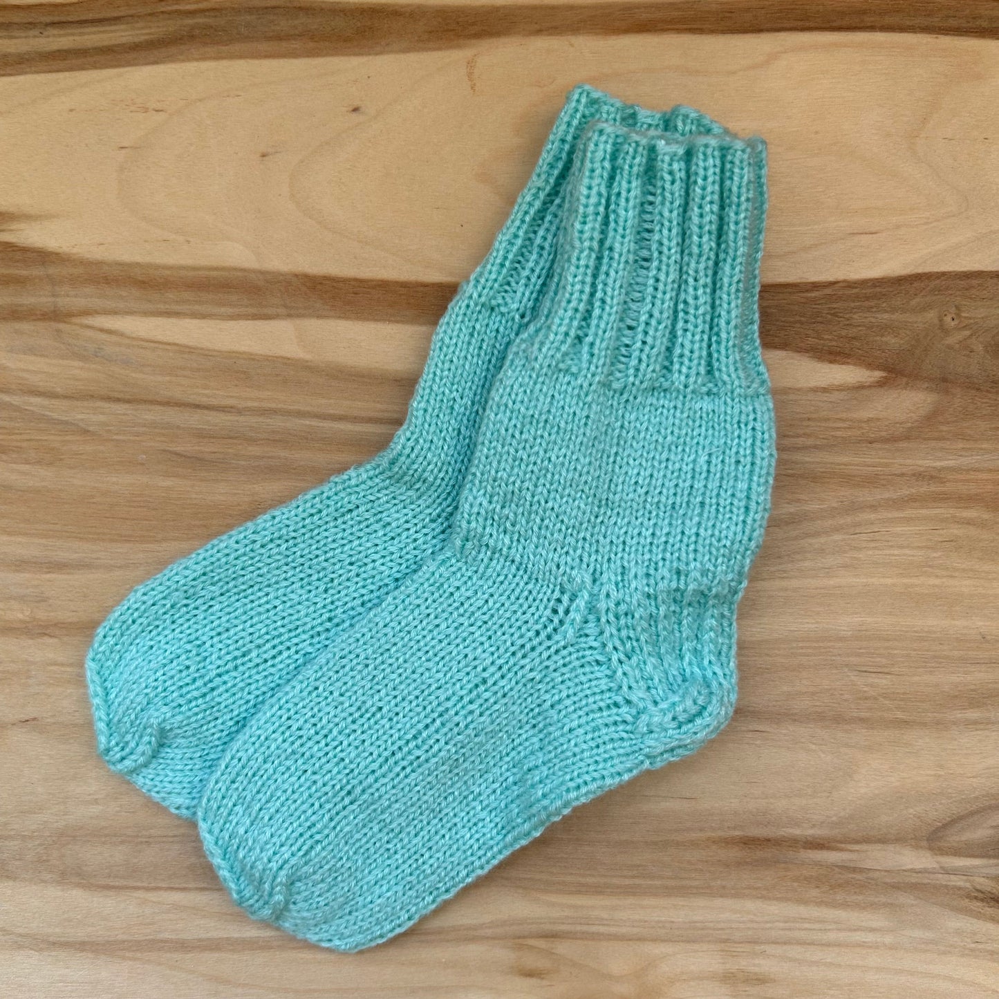 Gaiši zilganzaļas adītas siltās zeķītes 21.-23.izm. (SITĒ 52)