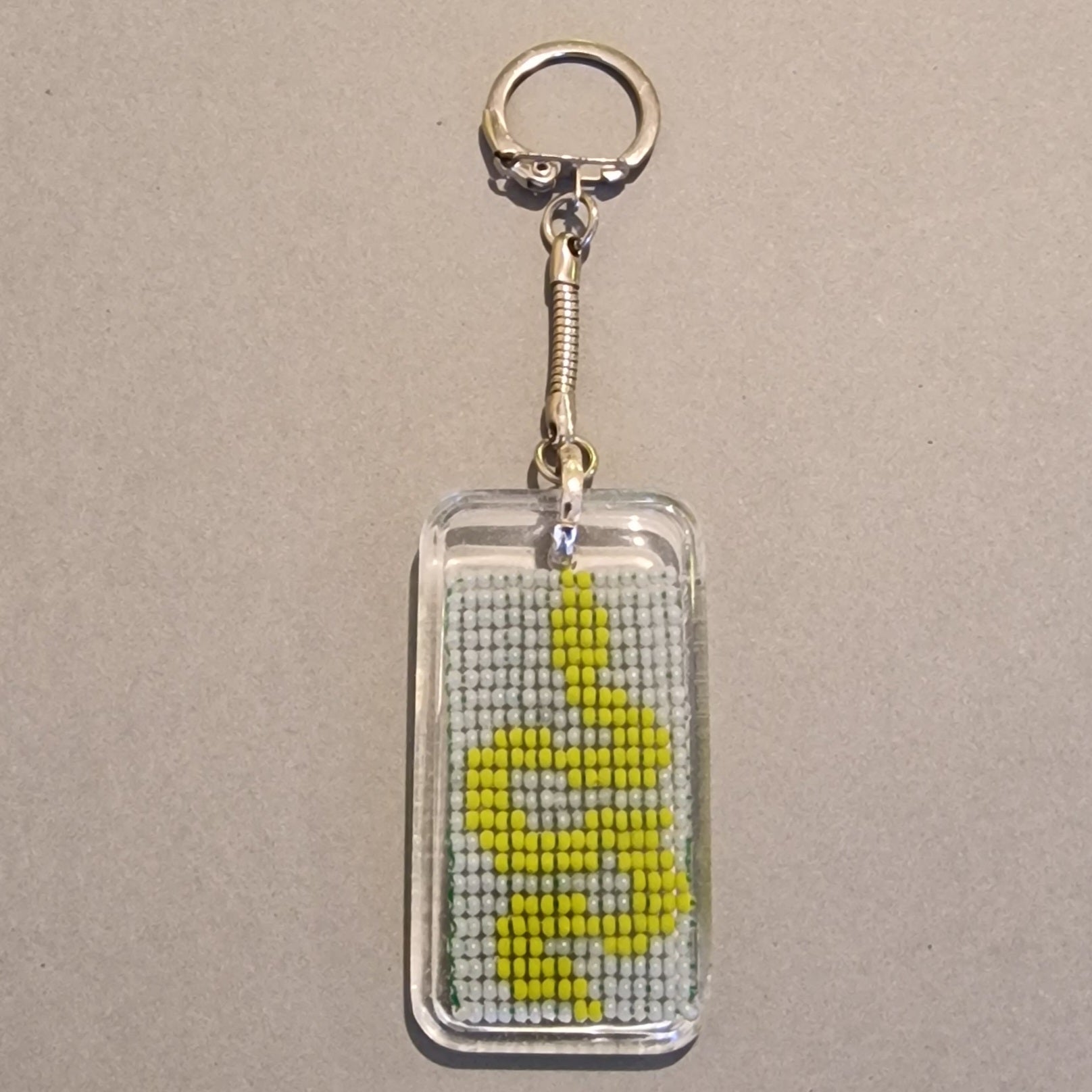 Atslēgu piekariņš "dzeltena čūska" (SPKA 63) - www.tiptip.lv 