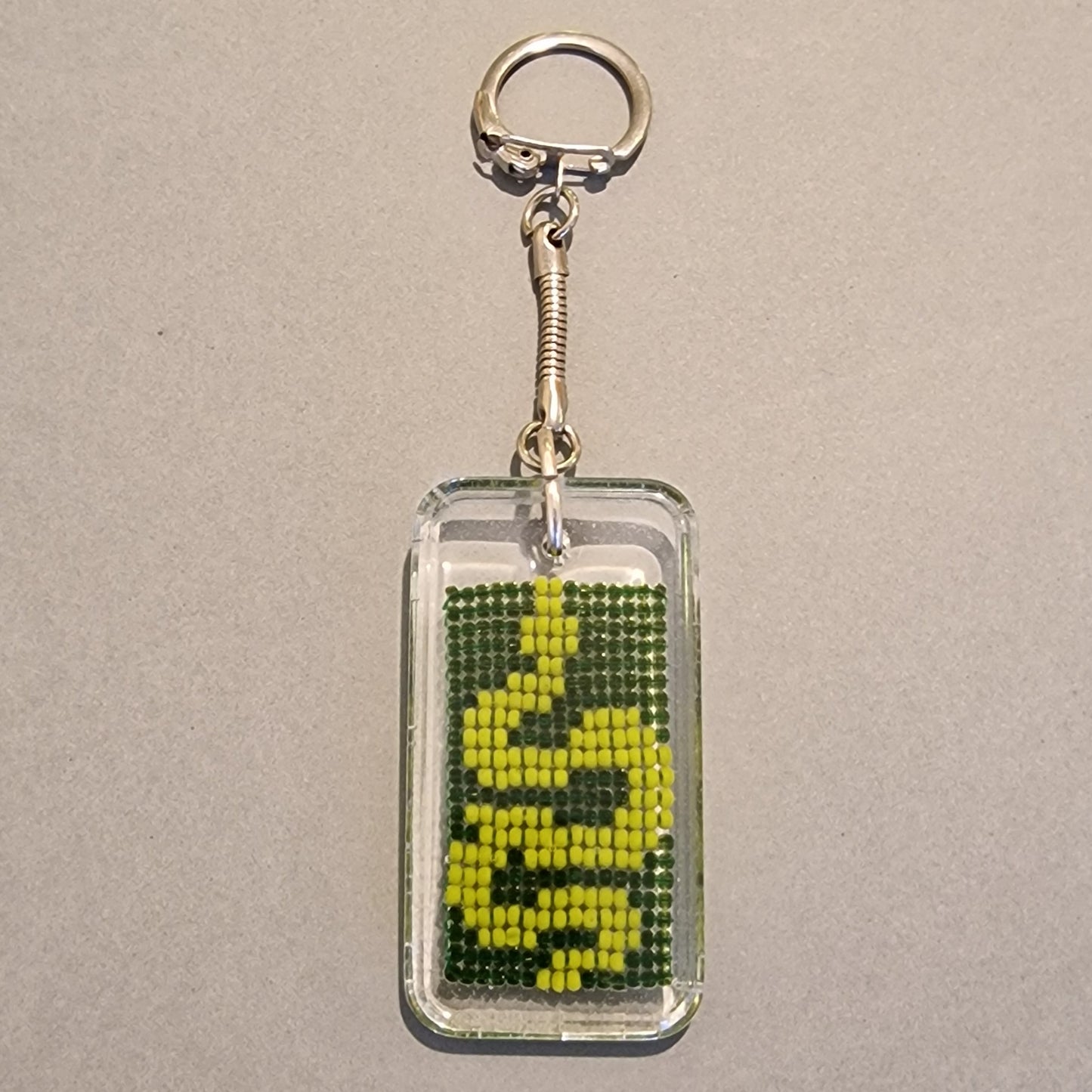 Atslēgu piekariņš "dzeltena čūska" (SPKA 65) - www.tiptip.lv 