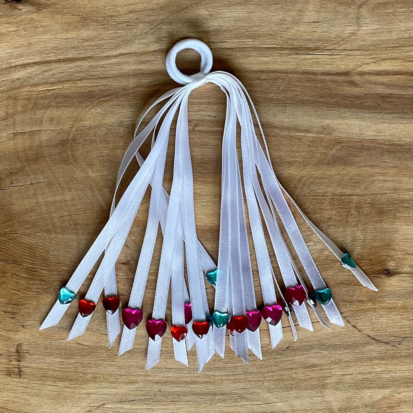 Balta lentīšu matu gumija (IRFI 57) - www.tiptip.lv 