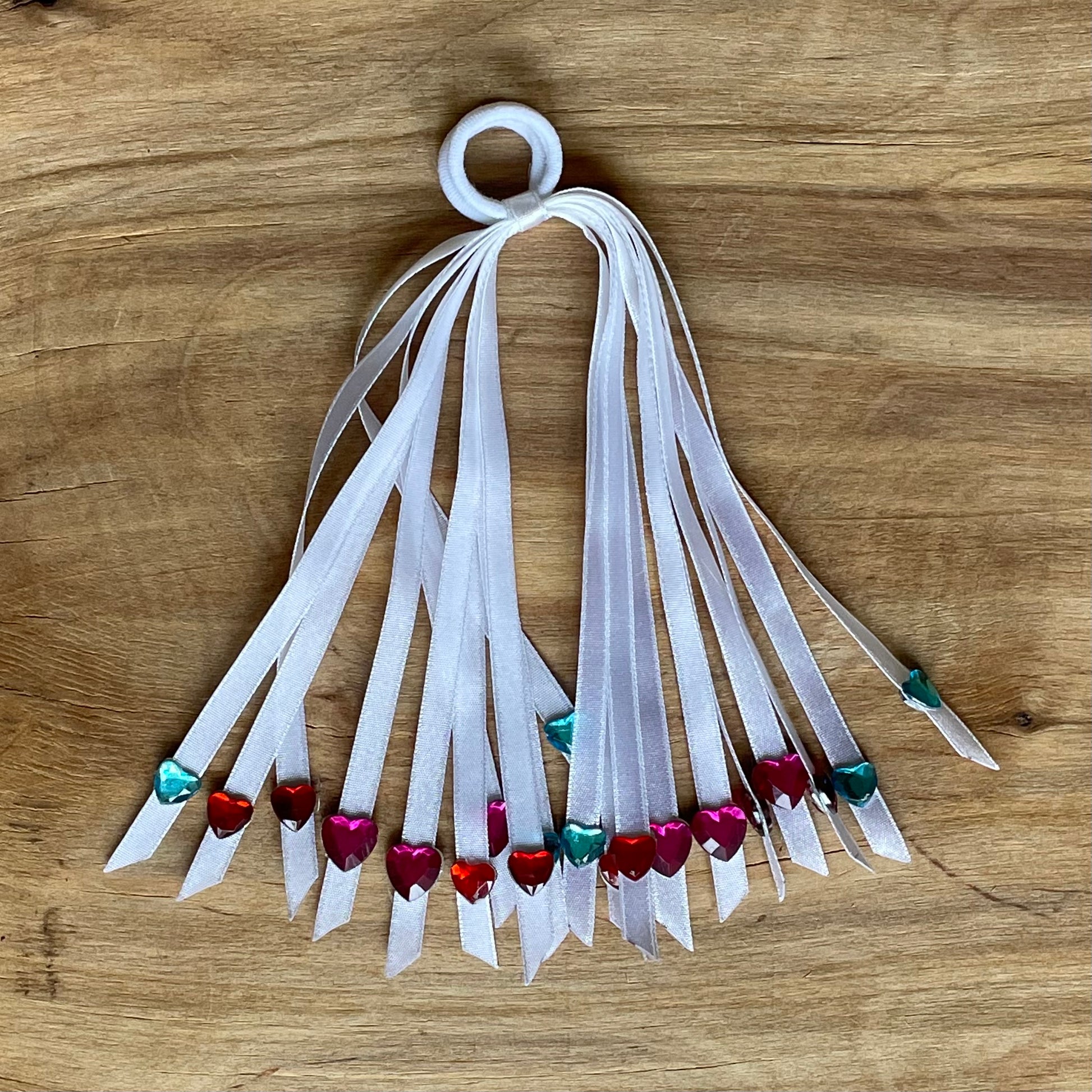 Balta lentīšu matu gumija (IRFI 57) - www.tiptip.lv 