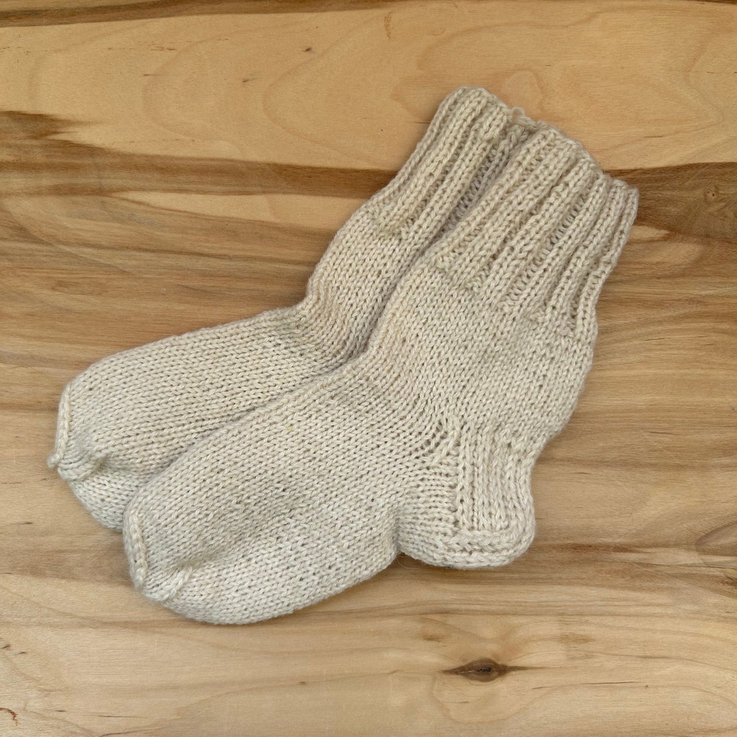 Pienbaltas  adītas siltās zeķītes 22.-24.izm. (SITĒ 51)