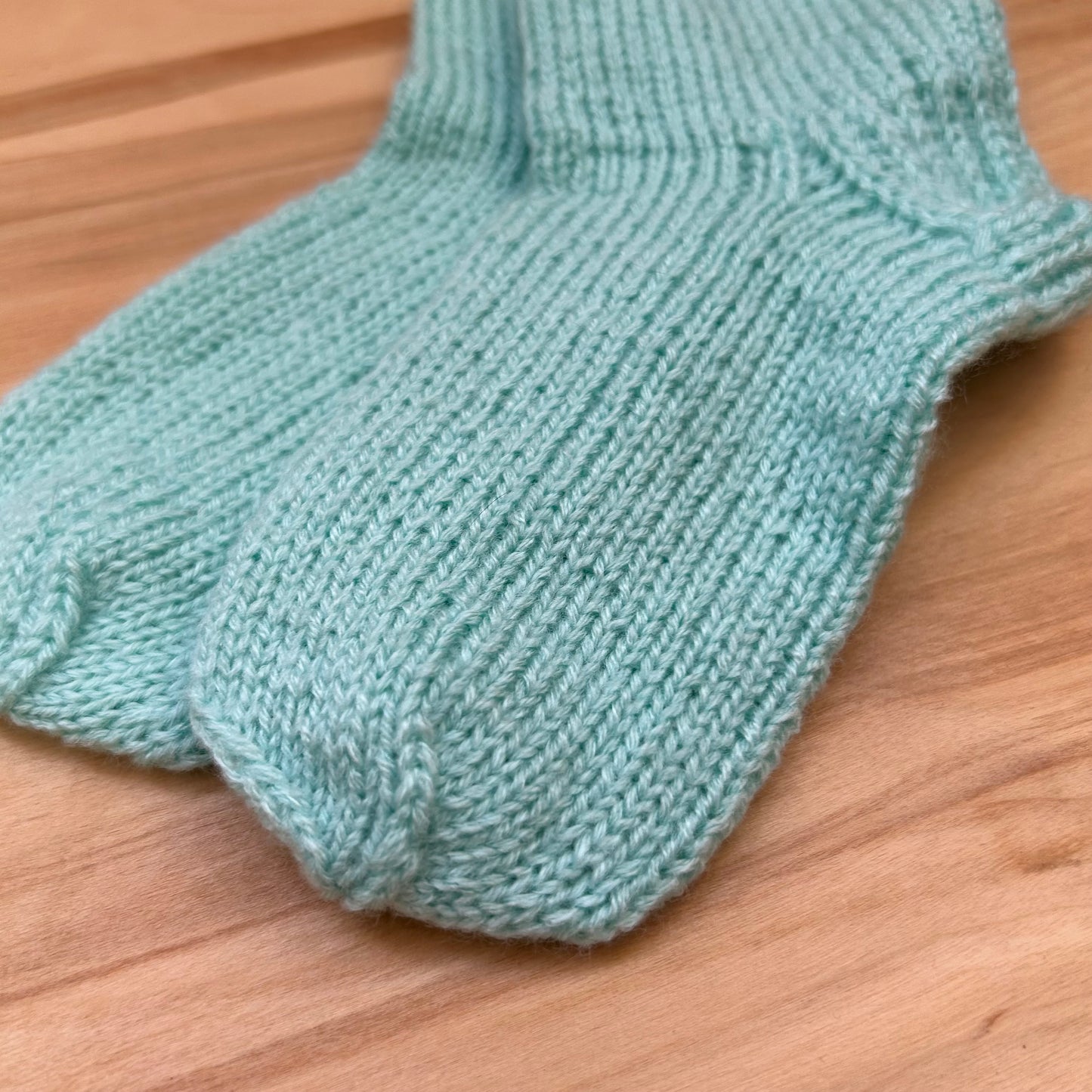 Gaiši zilganzaļas adītas siltās zeķītes 21.-23.izm. (SITĒ 52)