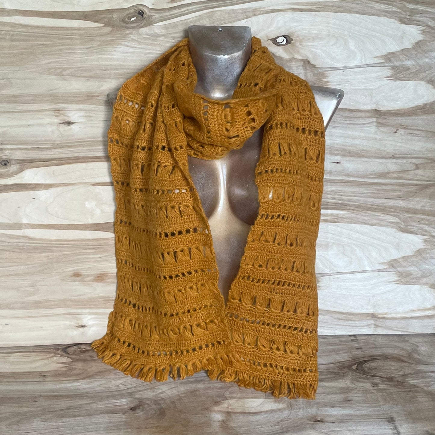 Rust colored scarf with decorative pattern and fringes (INKL 6)