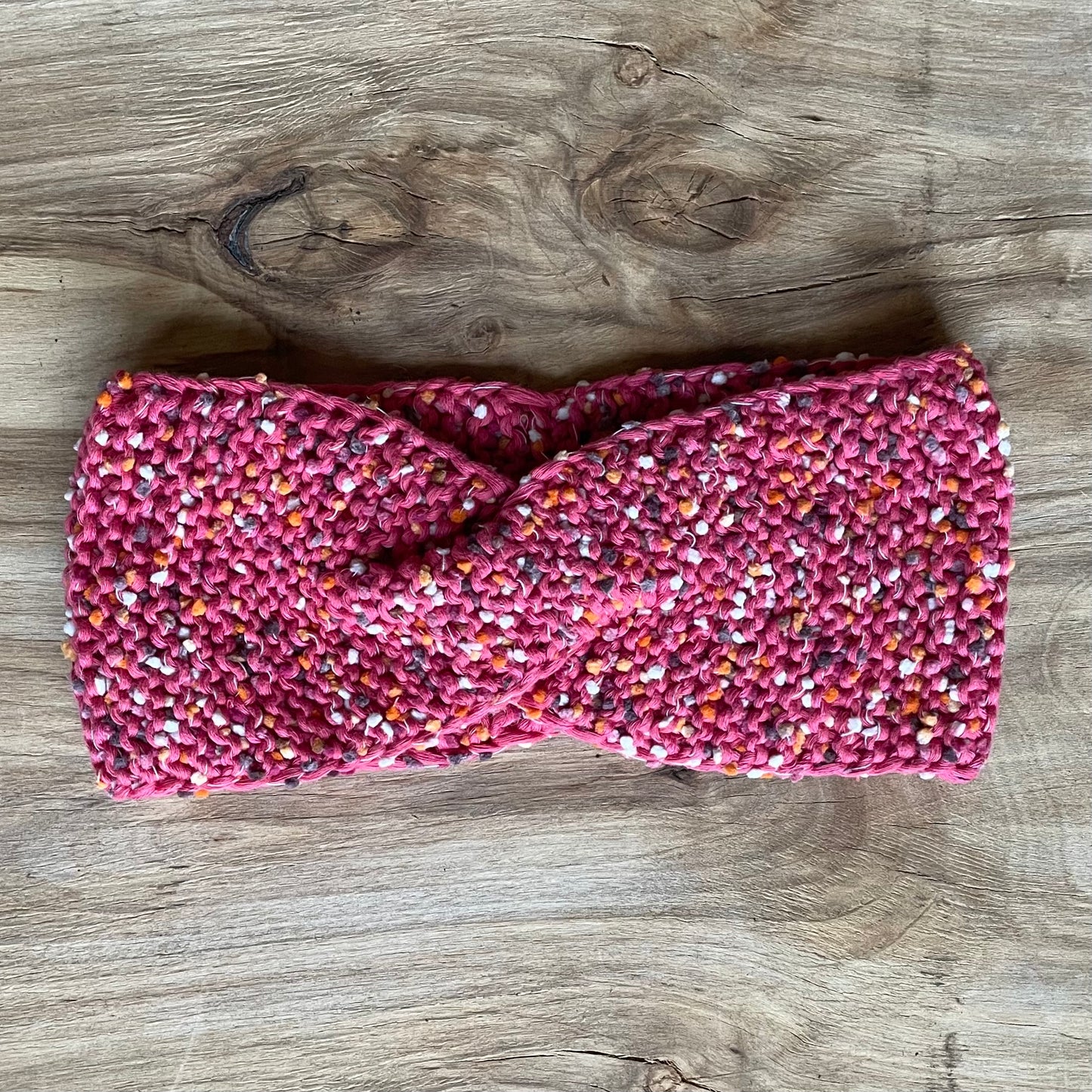 Bright pink head band with colorful yarn balls (VEPA 95)