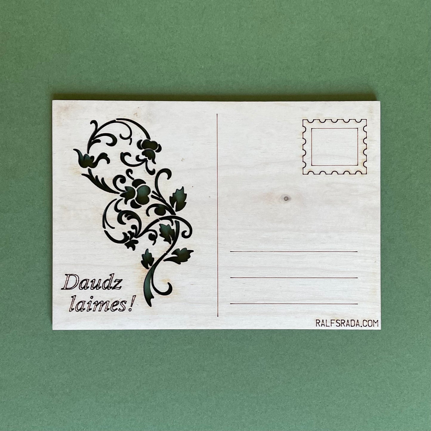 Plywood postcard with milled flowers and writing "Lots of  luck!" in Latvian (RAJO 40)