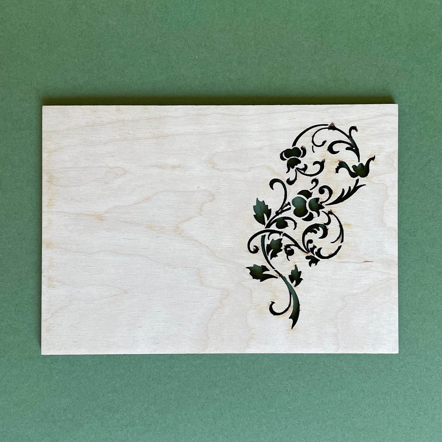 Plywood postcard with milled flowers and writing "Lots of  luck!" in Latvian (RAJO 40)