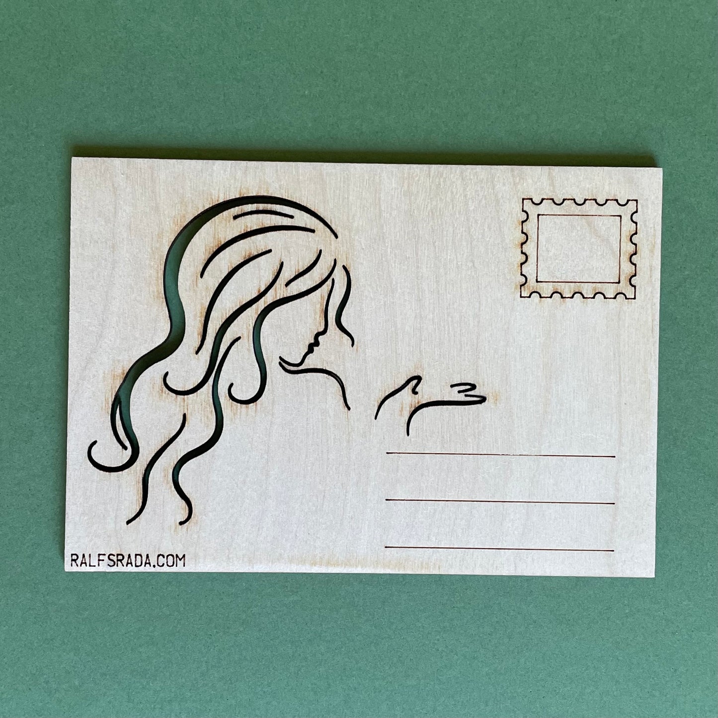 Plywood postcard with milled silhouette of a woman (RAJO 43)