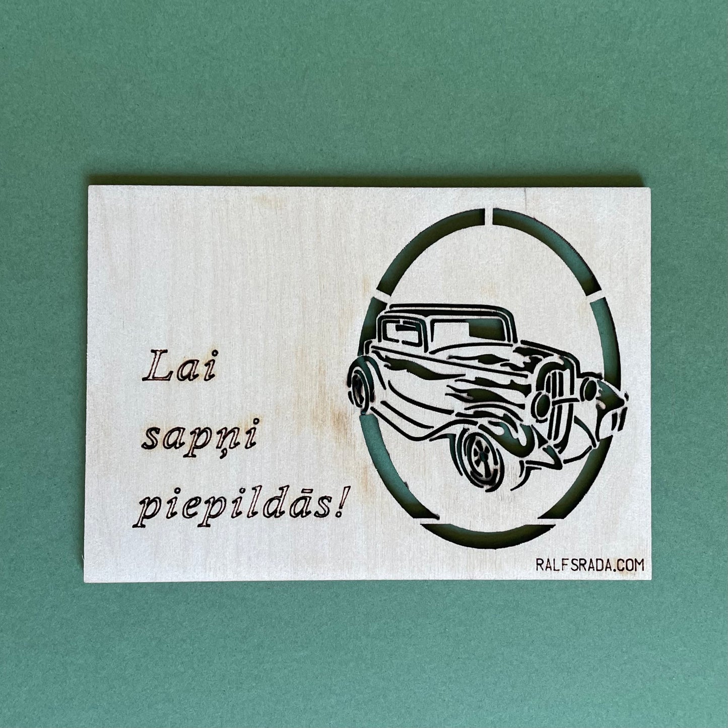 Plywood postcard with milled car and "May dreams come true" writing in Latvian (RAJO 46)