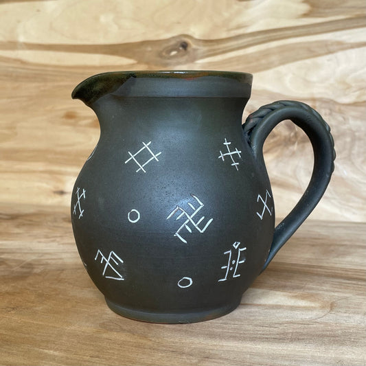 Ash gray clay pitcher with Latvian ornaments (MASP 82)