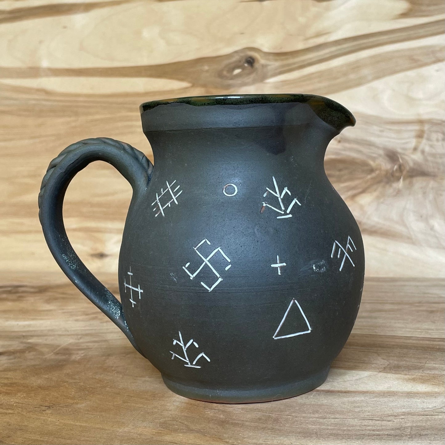 Ash gray clay pitcher with Latvian ornaments (MASP 82)