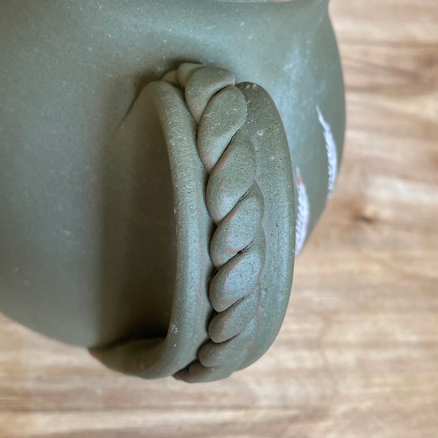 Dark green clay pitcher with nature elements (MASP 83)