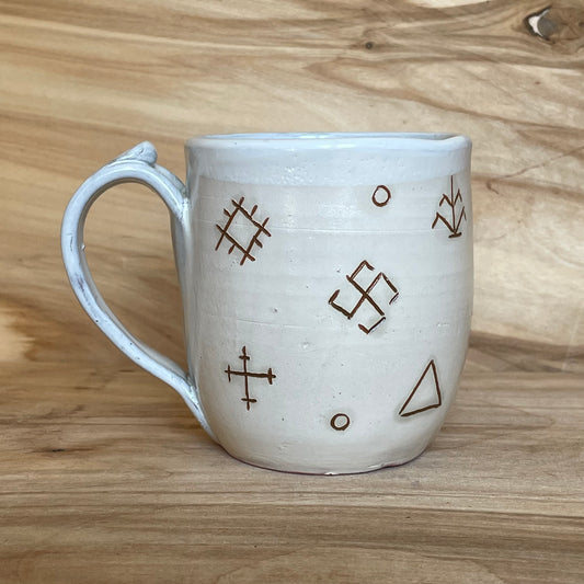 Light colored clay mug with illustrations (MASP 77)