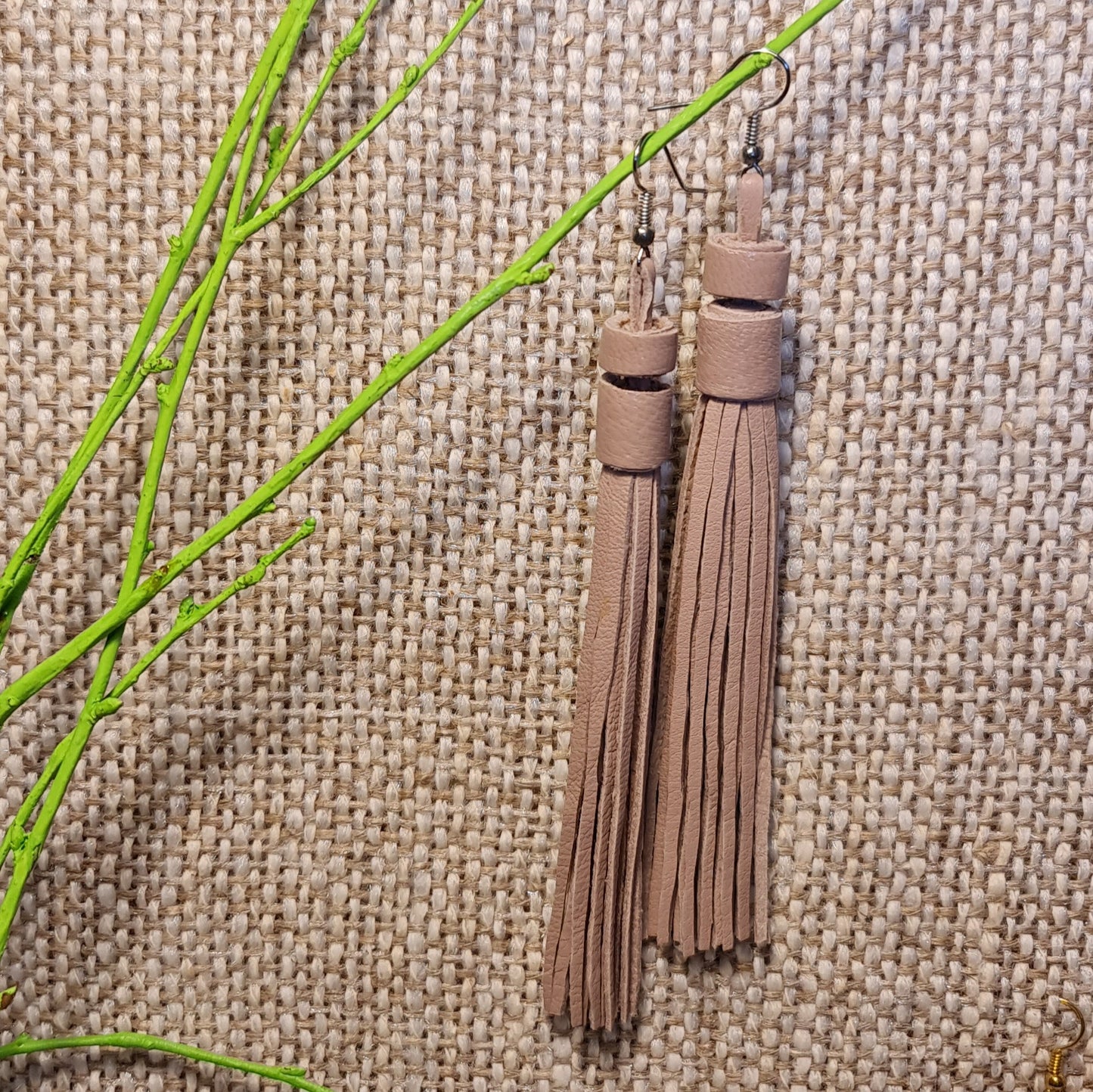 Light leather string earrings in tongue color from leather strips of equal length (length 13 cm) top row 4th from the left (JŠČ)