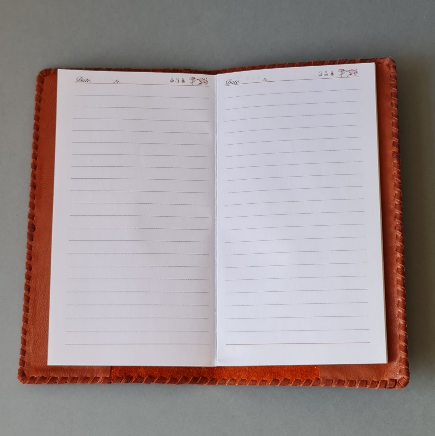 Dienasgrāmata. Kalendāra daļa maināma. Ādas vāki brūnos / sarkanīgos / oranžīgos toņos. 10.5 x 18.5 cm (MAPL)