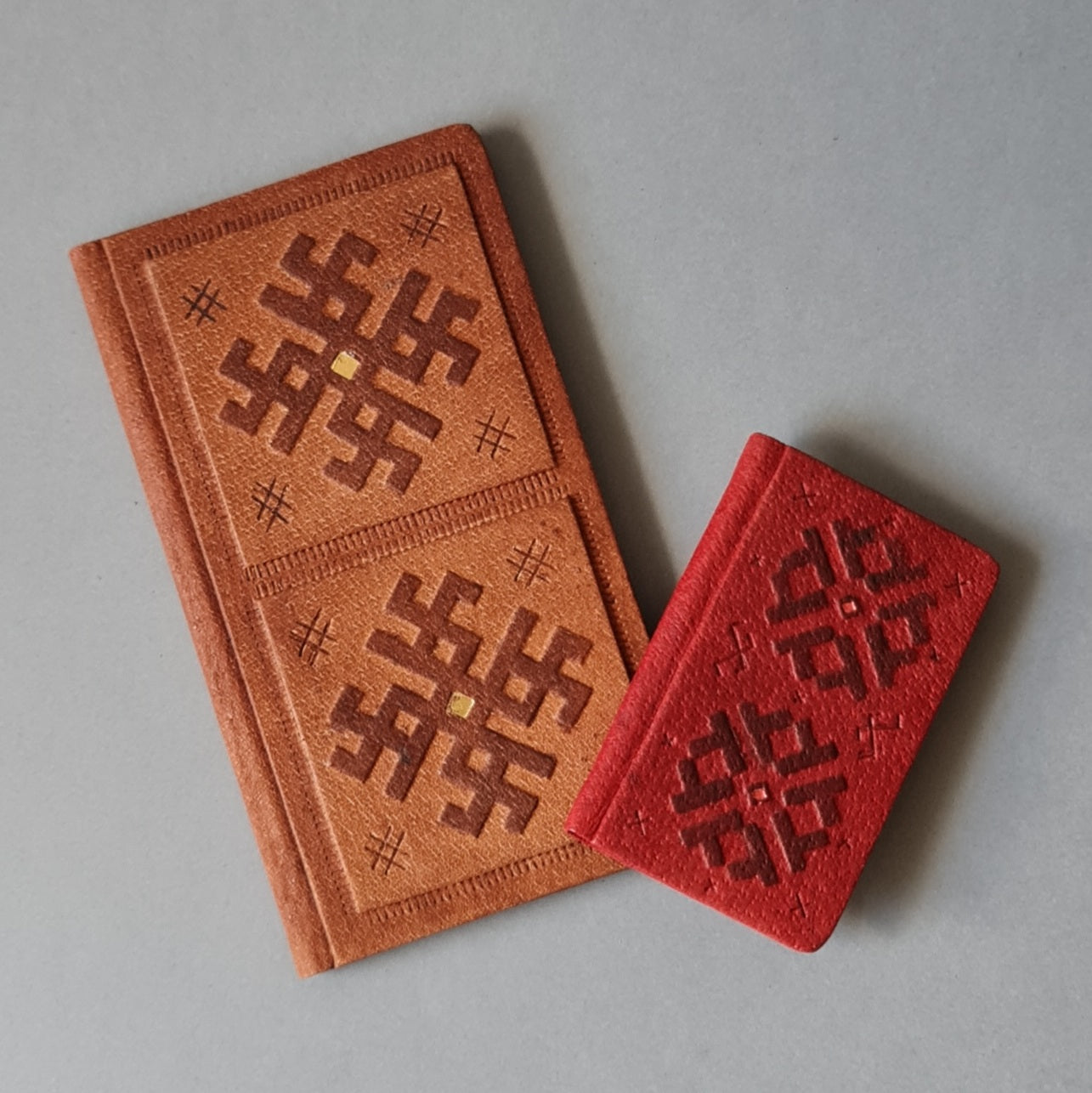 Phone book with Russian alphabet in leather cover. Dark red color with a decorative print. Mini 5.8 x 8.9 x 0.9 cm (MAPL)