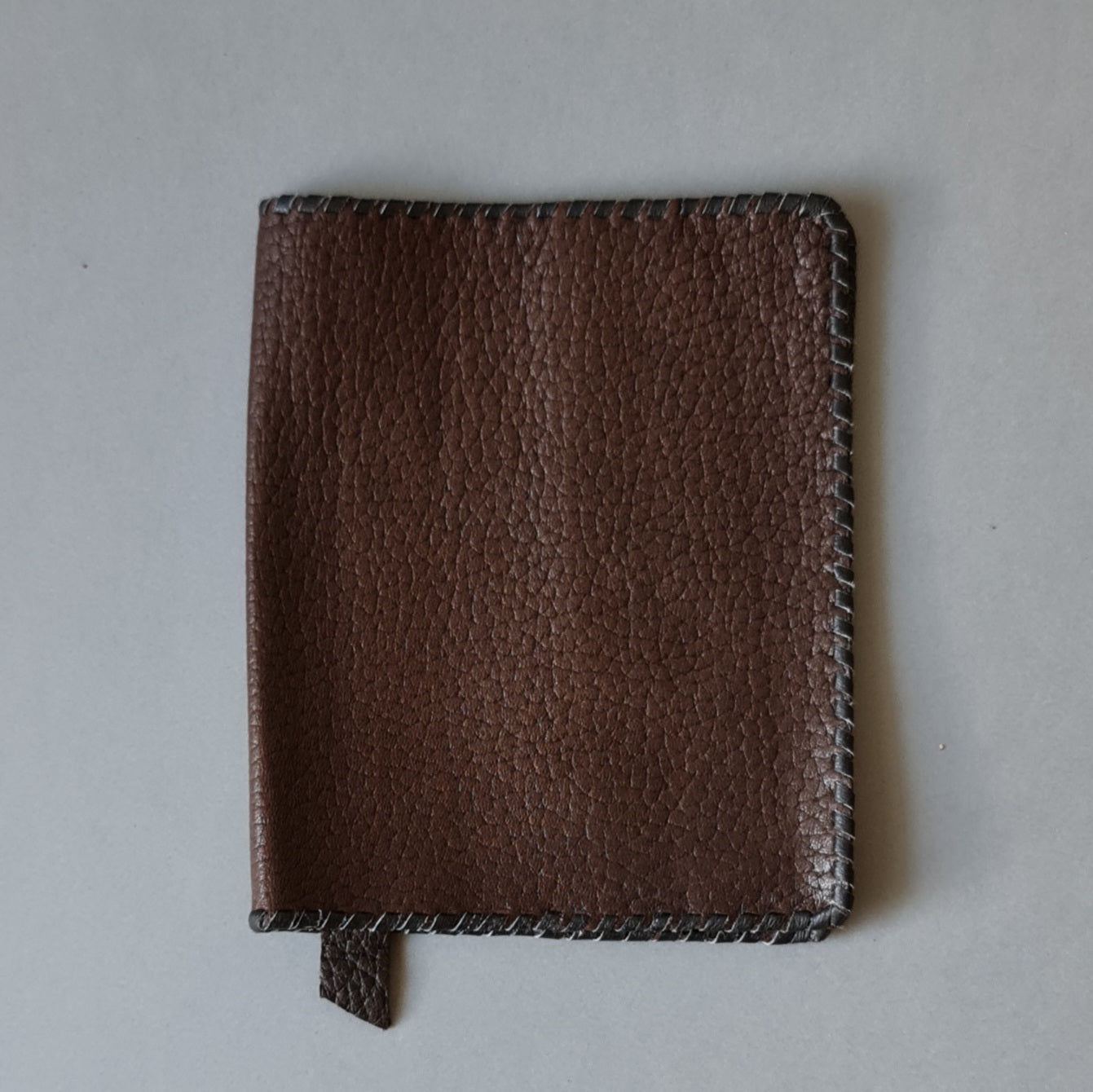 Book covers. Leather / dark brown / soft with bookmark and leather lining. Open 25 x 15 cm (MAPL)