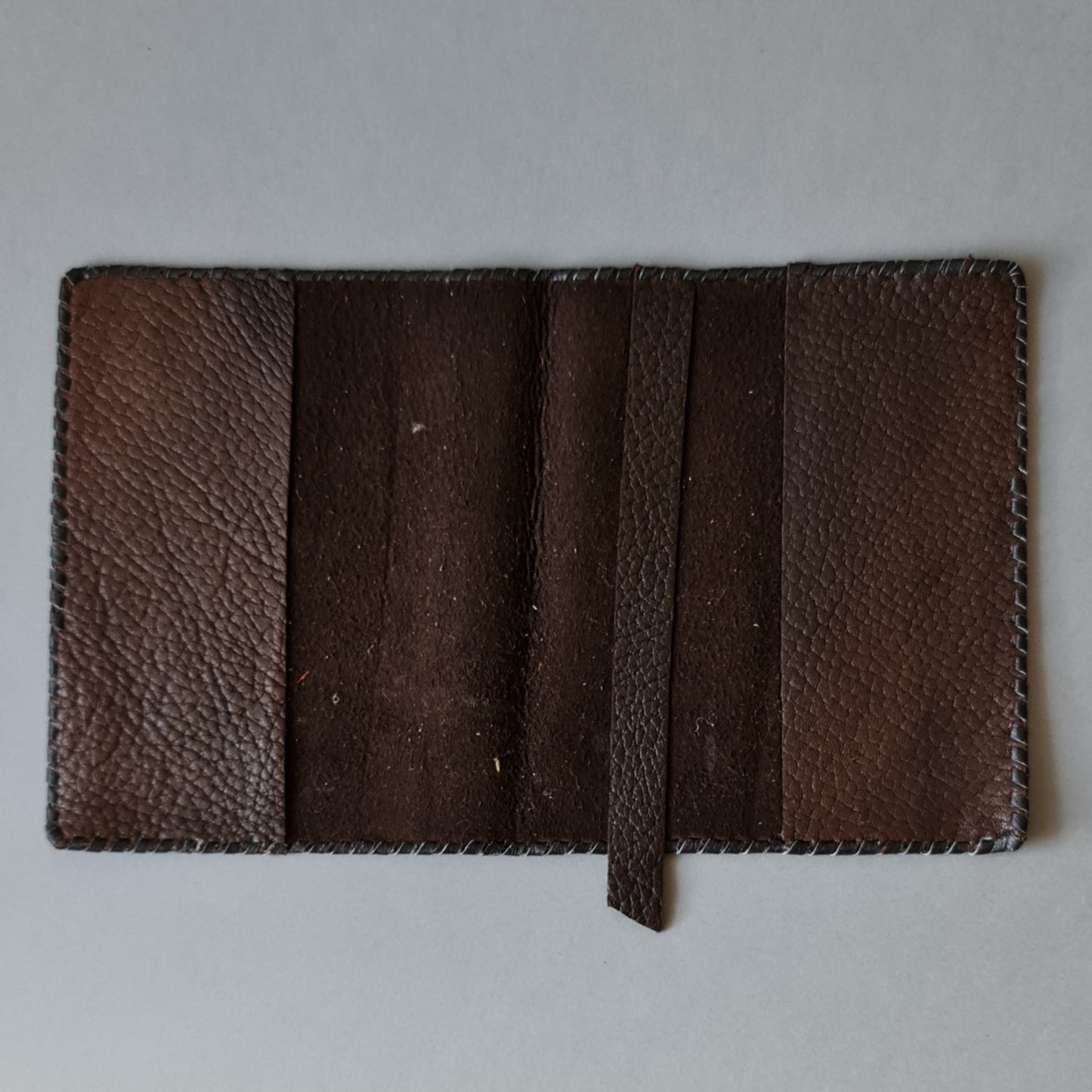 Book covers. Leather / dark brown / soft with bookmark and leather lining. Open 25 x 15 cm (MAPL)